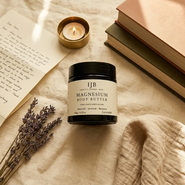 IJB jar flatlay with lavender and books